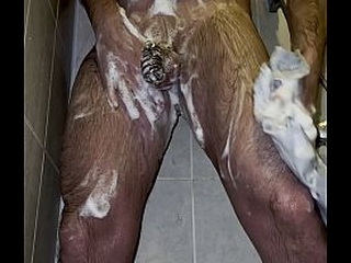 I'_m taking a shower with a chastity belt on my penis!